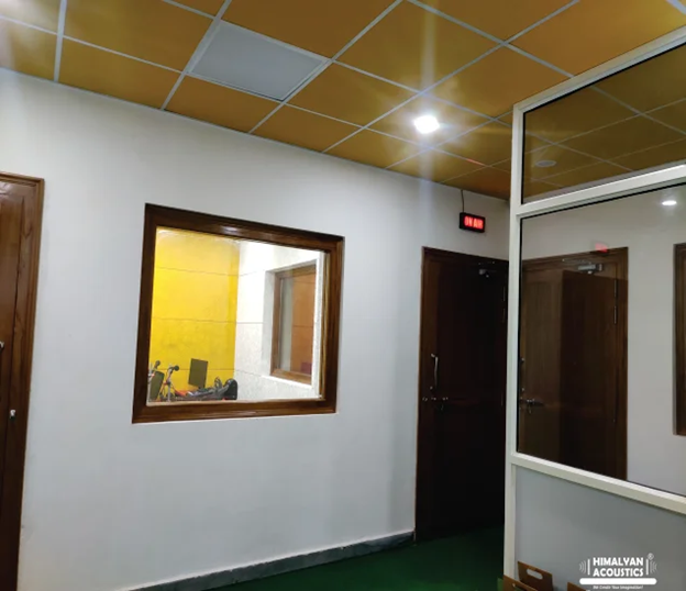 Soundproof studio door and acoustic wall treatment